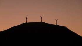 Weld Cone's three turbines at dusk